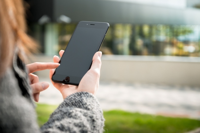 woman holding a smartphone